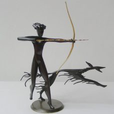 black sheet metal and brass statue, made 1950s