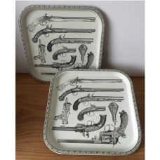 Fornasetti two pistol trays