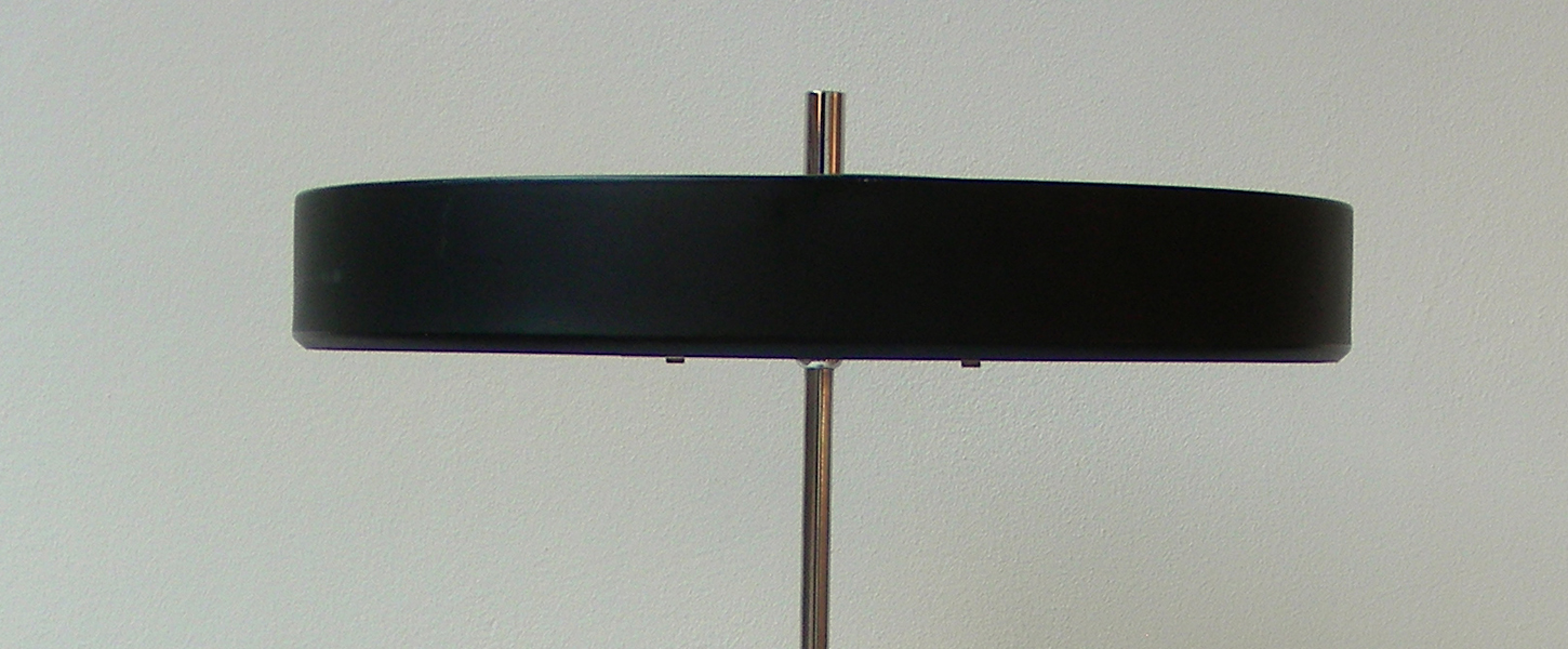 ajustable black metal and chrome desk lamp